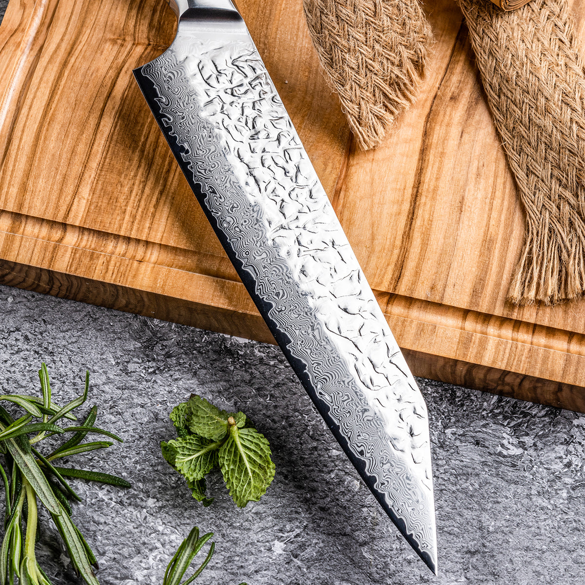 Asiro Kiritsuke standing on cutting board with fennel