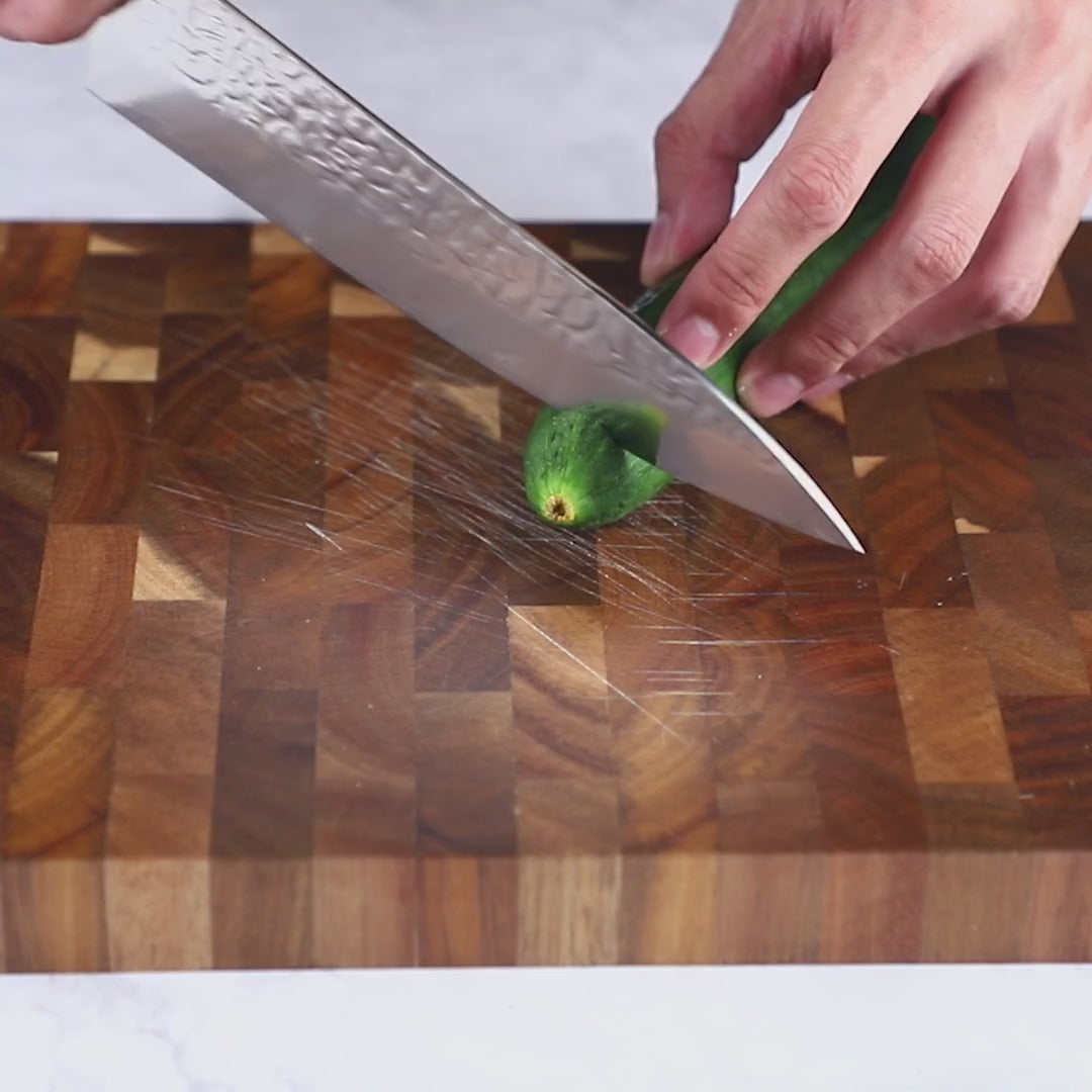 Asiro Chef Knife slicing cucumber and tomato